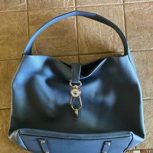 Dooney Bourke pebble grain logo lock bag